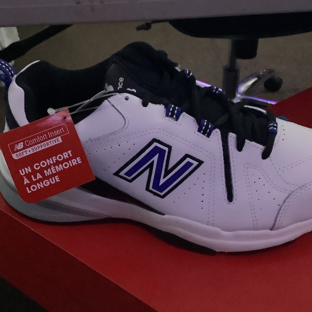 New Balance Men's White and Black Athletic Shoes with Blue Accents